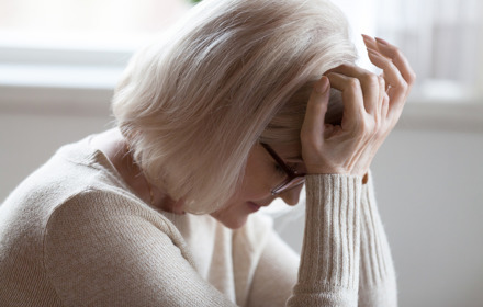 Woman With Hands On Her Head