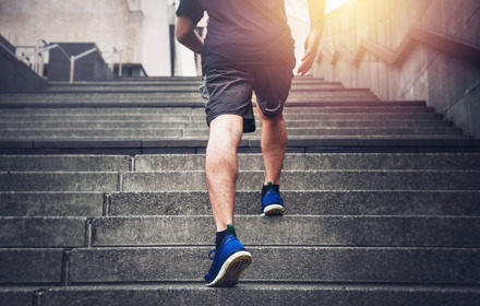 Man Running Up Stairs
